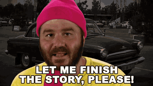 a man wearing a pink hat and a yellow shirt says " let me finish the story please "