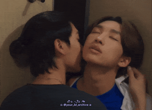 a couple kissing with a watermark that says your_bl_archive a