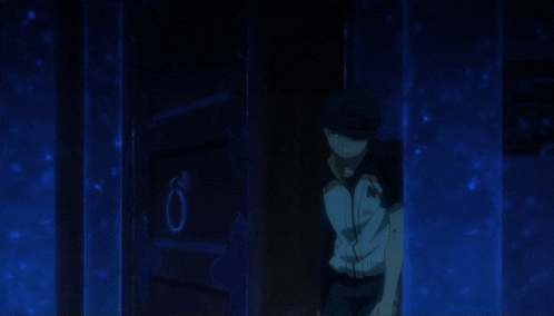 a man and a woman are standing in a dark room with a blue background