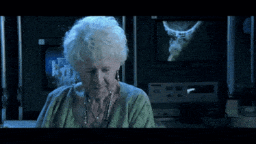 an elderly woman says it 's been 84 years in front of a monitor