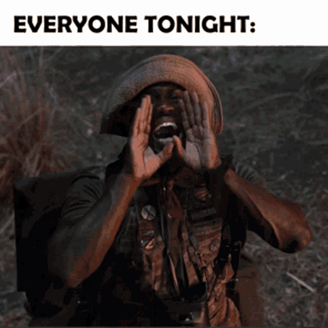 a man in a cowboy hat is shouting with the words everyone tonight behind him