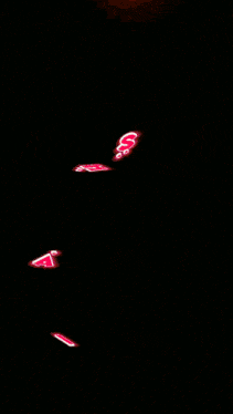 a woman with a heart in her mouth is surrounded by pink flowers