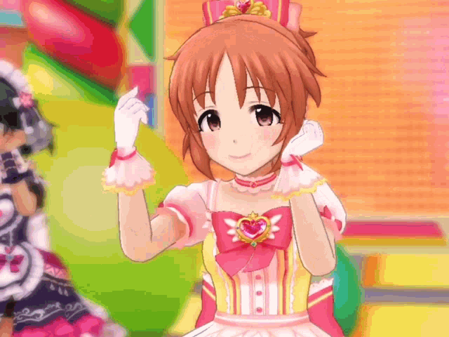 a girl in a pink dress with a heart on her chest