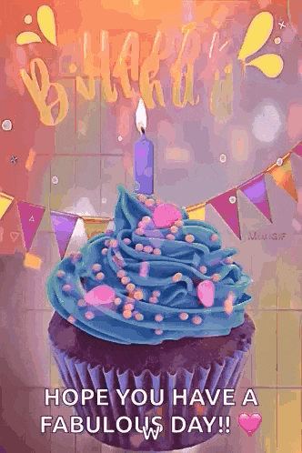 a cupcake with blue frosting and a candle on top of it .