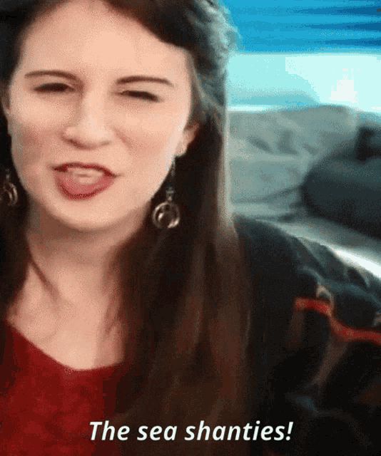 a woman with her tongue out and the words the sea shanties behind her