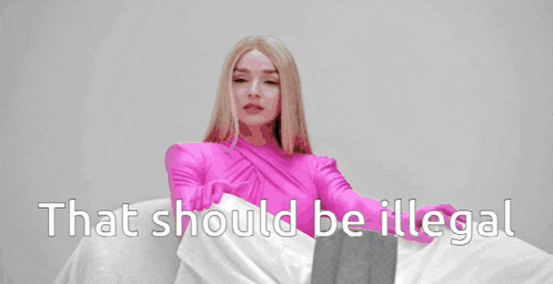 a woman sits on a bean bag chair while another woman sits in a chair with the words that should be illegal behind them