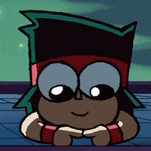 a close up of a cartoon character 's face with big eyes and a red headband .