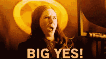 a woman with a surprised look on her face and the words big yes behind her