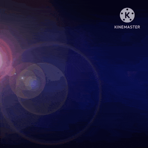 a woman wearing sunglasses and horns is in a circle with a k in the corner