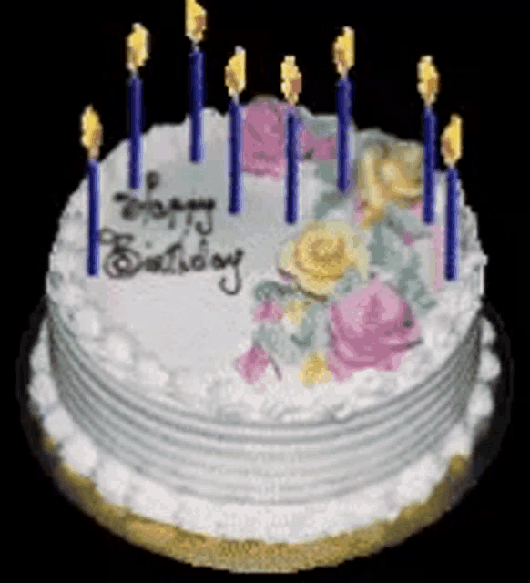 a birthday cake with blue candles and the words happy birthday on it