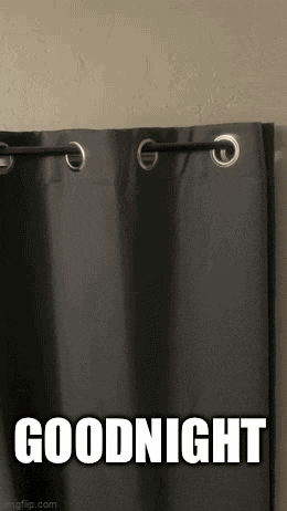 a black curtain with the words `` goodnight '' written on it .
