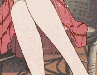 a woman in a pink dress is sitting on a chair with her legs crossed .