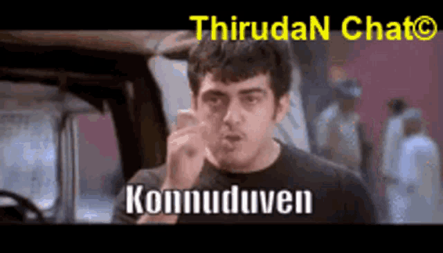 a man in a black shirt is making a funny face with the words konnuduven in the corner