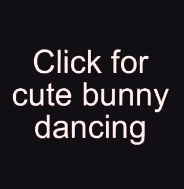 a person is holding a small brown rabbit on a bed .