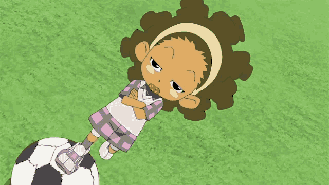 a cartoon of a girl laying on a soccer ball with her arms crossed
