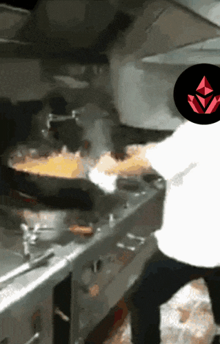 a person is cooking on a stove with a red triangle in the corner