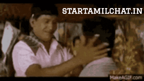 a man is hugging another man in front of a sign that says starttamilchat in
