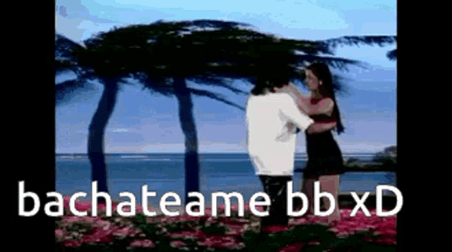 a man and a woman are dancing in front of a body of water with the words bachateame bb xd on the bottom