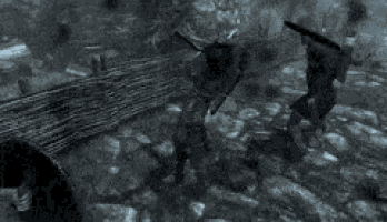 a man is laying on the ground with a sword and shield