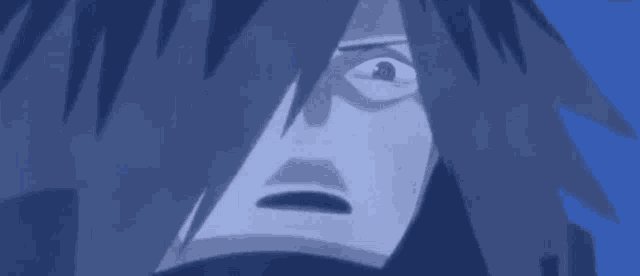 a close up of a cartoon character 's face with a blue sky in the background .