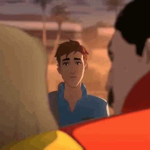 a man in a blue shirt is talking to another man in a red jacket .