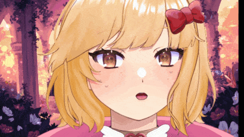 a girl with blonde hair and a red heart bow on her head