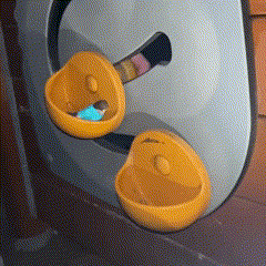 a close up of a toaster with two yellow buttons on it