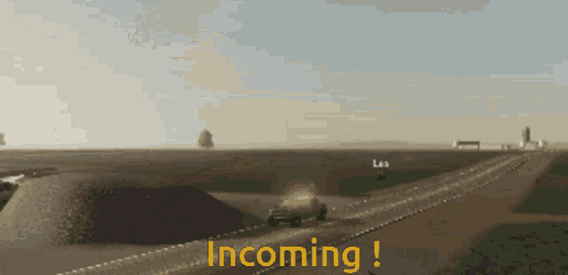 a truck is driving down a dirt road with the words incoming written on the bottom
