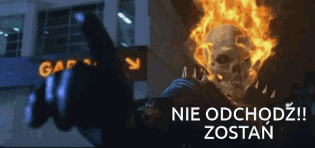 a ghost rider giving the middle finger in front of a sign that says garage
