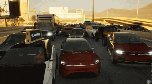 a busy highway with cars and trucks and a bus that says ' g ' on the top of it