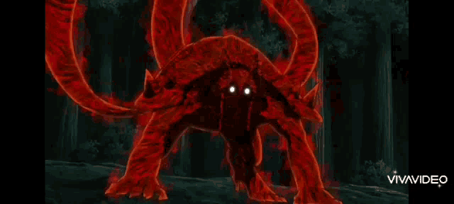 a red monster with a white face is standing in the dark .