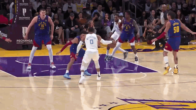 a basketball game is being played in front of a pechanga resort casino