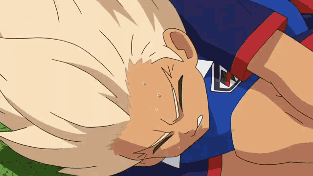 a cartoon character is laying on the ground with his eyes closed and a blue shirt with the letter l on it