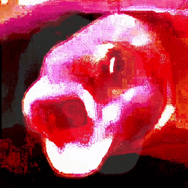 a painting of a clown 's face with the mouth open