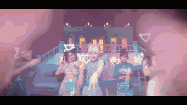 a group of girls are dancing in front of a building in a pixel art style