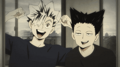 two anime characters are posing for a picture and one of them is flexing his muscles