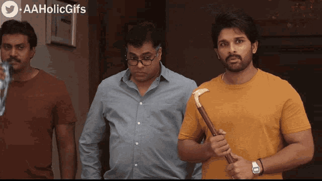 two men are standing next to each other with aaholicgifs written on the bottom left