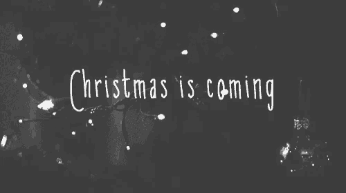 a black and white photo with the words christmas is coming on it