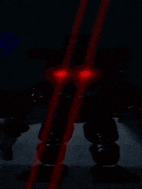 a teddy bear with red eyes is surrounded by red laser beams