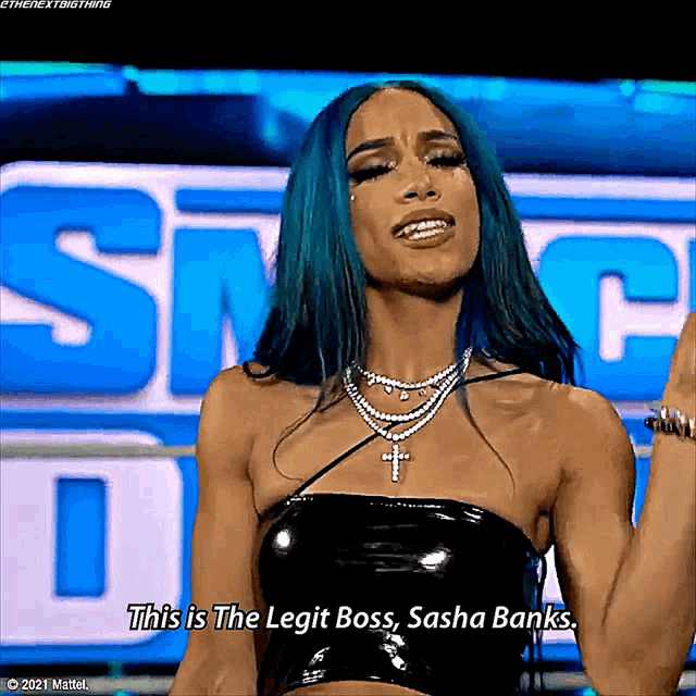 a woman with blue hair says this is the legit boss sasha banks .