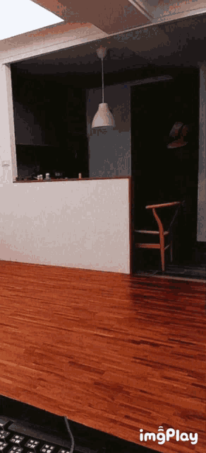 a picture of a wooden floor with the words imgplay on the bottom right