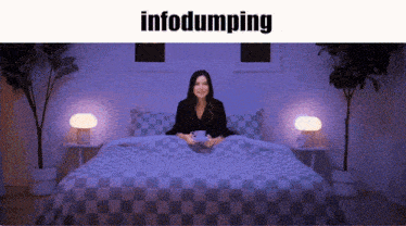 a woman is sitting on a bed under a blanket with the word infodumping above her