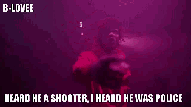 a man in a red hoodie with the words heard he a shooter i heard he was police