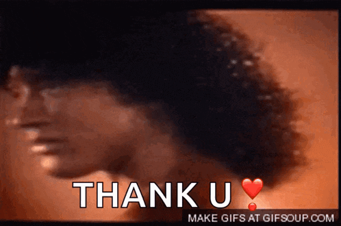 a gif of a man saying thank you with a red heart