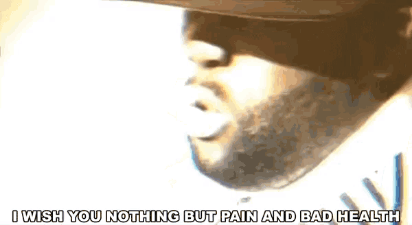 a man with a beard wearing a baseball cap says i wish you nothing but pain and bad health ..