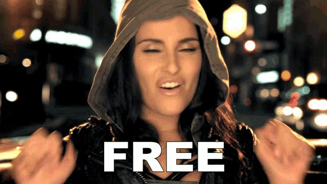 a woman wearing a hooded jacket with the word free on her chest