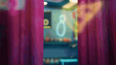 a blurred image of a number 8 on a wall