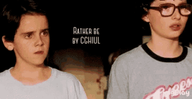 two young boys are standing next to each other and the words rather be by cghiul are on the bottom