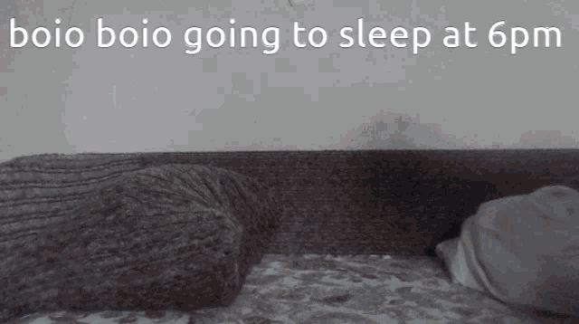 a couch with the words boio boio going to sleep at 6 pm written on it