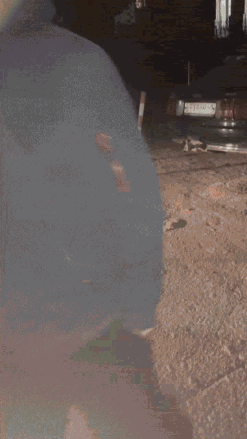 a blurry photo of a person 's face with a dark background